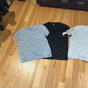 Four Men’s Zelle and Nike Workout shirts